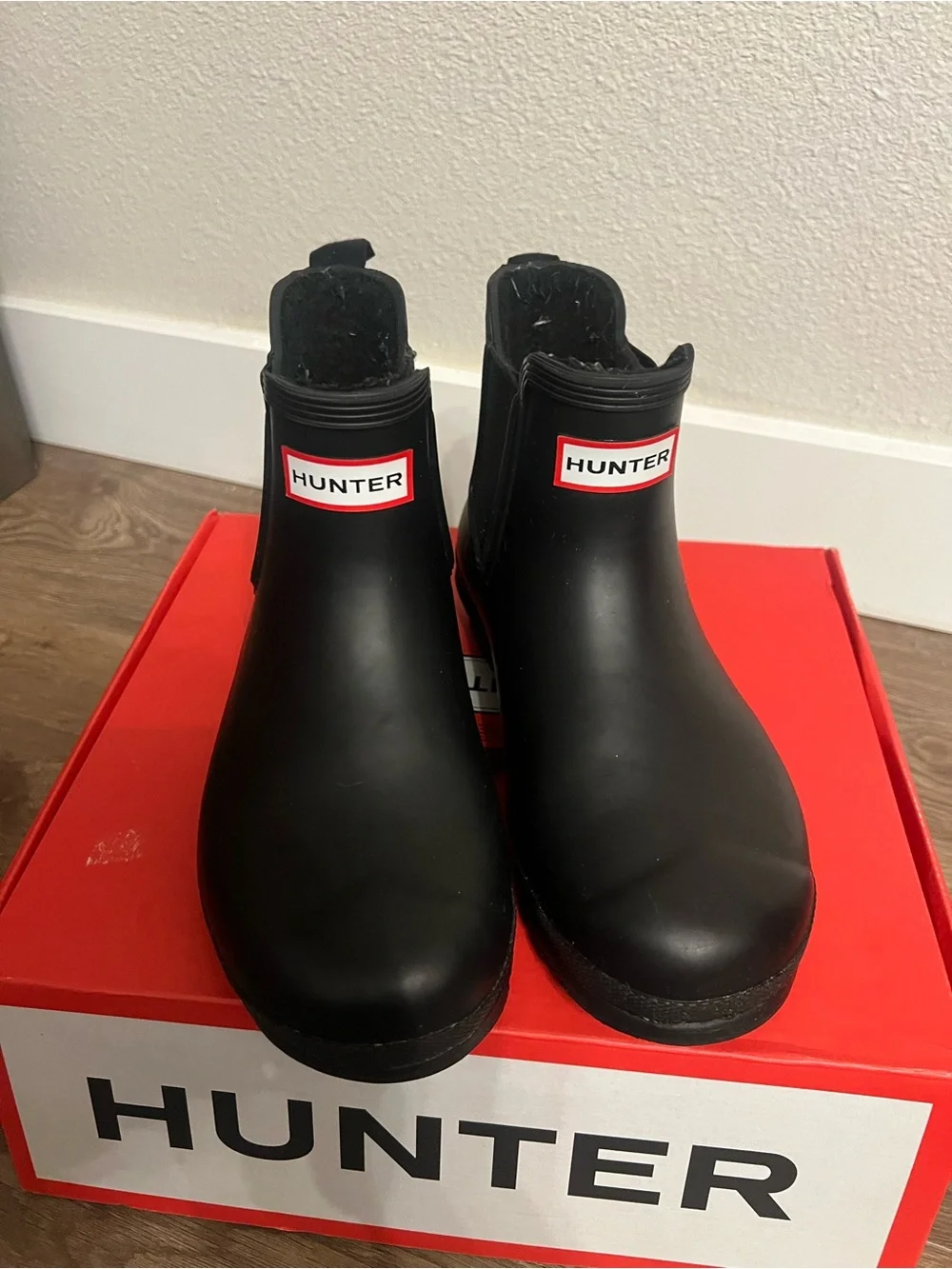 Hunter Women’s Black Chelsea Rain Boots with Red Logo